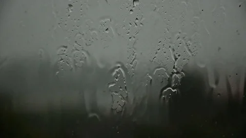 Rain wet window, despair. The man at the window in sorrow. Stock Footage 98416788