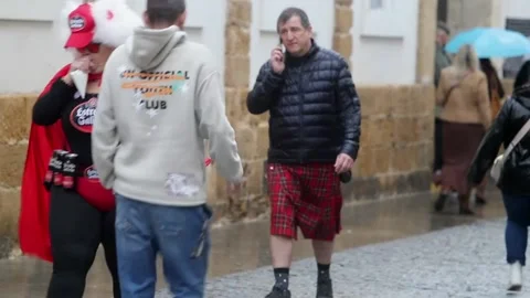 Rain, wind challenge but not dampen Carnival spirit in Spain's Cádiz, Cádiz, ES  Stock-Footage 264219373