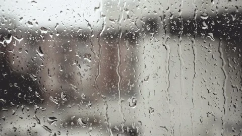 Rain on the window with blurred background Stock Footage 106089792