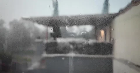 Rain on Window with Blurred Residential Background in Tepotzotlan Mexico Stock Footage 345525468