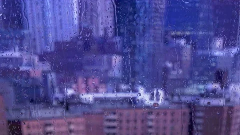 Rain on the window city view  Stock Footage 168897711