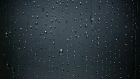 Rain on window. Drops Dripping Down The Glass Stock Footage 160486143