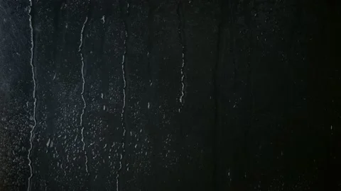 Rain on window. Drops Dripping Down The Glass Stock Footage 160486153