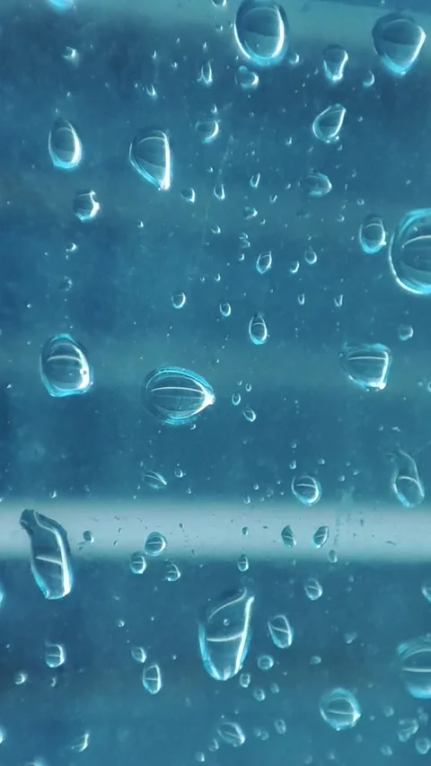 Rain on the window glass of the building Stock Footage 323213790