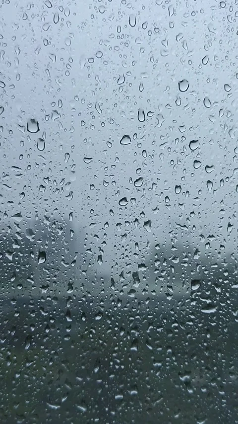Rain on the window glass of the building Stock Footage 323213872