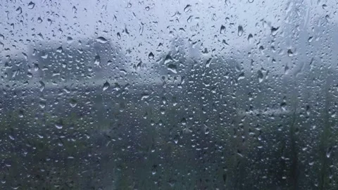 Rain on the window glass of the building Stock Footage 323213953