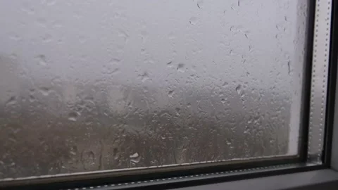 Rain window house. Raindrops trickle down the gray glass. Stock Footage 167945779