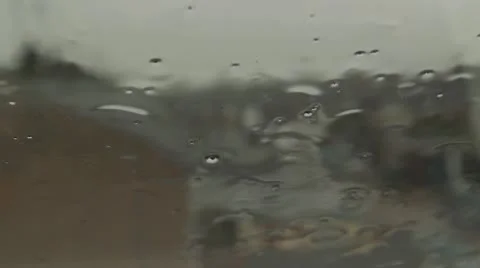 Rain on Window with Houses in Background HD File Stock Footage 10682393