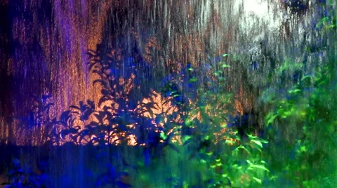 Rain in the window with multi colored lights Video stock 41582433