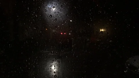 Rain on window at night Video stock 105667835