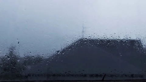 Rain, window, rainy day, buildings in background. Stock Footage 219726358