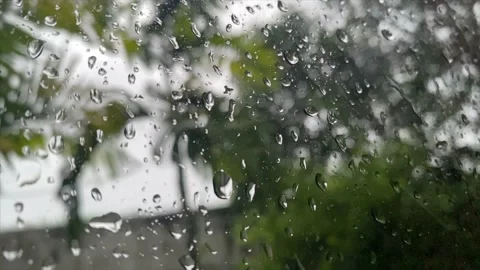 Rain on the Window in Slow Motion Stock Footage 150429536