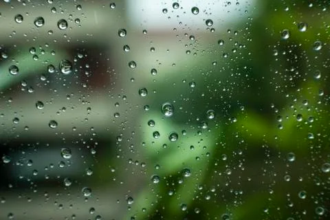 Rain on a Window, Small Drops of Water on a Window, Rain Drops Stock Photos