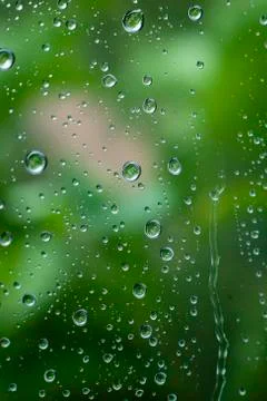 Rain on a Window, Small Drops of Water on a Window, Rain Drops Stock Photos