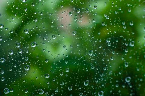 Rain on a Window, Small Drops of Water on a Window, Rain Drops Stock Photos