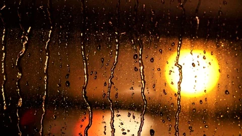 Rain on Window Traffic Lights in Background Close Up Stock Footage 78810146