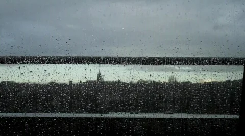 Rain on window, wide angle,urban scene in background Stock Footage 787057