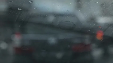 Rain on the windshield of the car Stock Footage 104928502