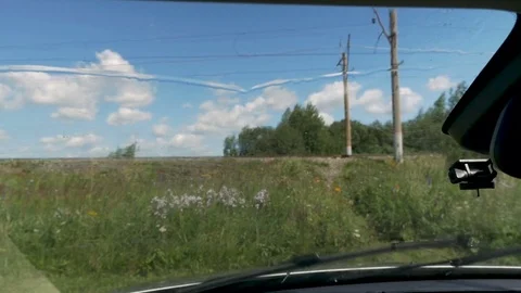 Rain on the windshield of the car. View from inside the cabin. Video stock 79770027