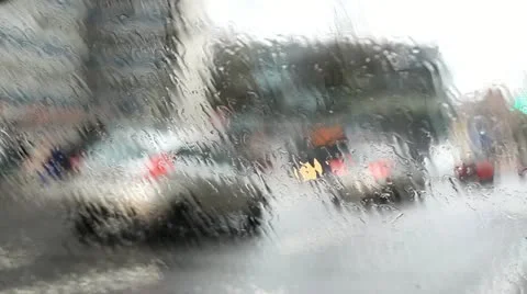 Rain on the windshield, defocused traffic Video stock 20543224