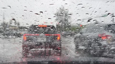Rain on Windshield with Traffic at Red Light During Hurricane, Miami Stock Footage 341366935