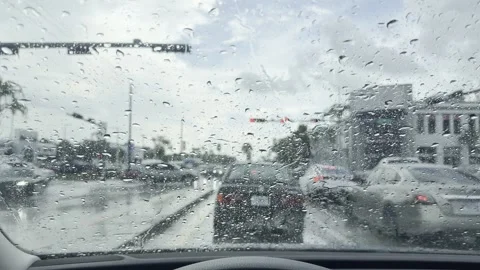 Rain on Windshield, Traffic Stopped at Red Light, With Sound, Miami Stock Footage 340828498