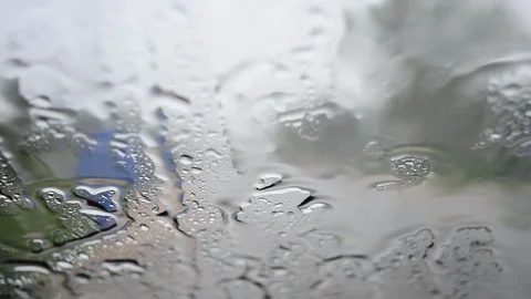 Rain on the windshield while driving Stock Footage 87166693