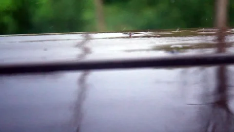 Rain on wood deck Stock Footage 257718035