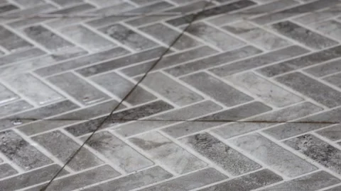 Rain on Zigzag Tile Pattern Stock Footage 278513184