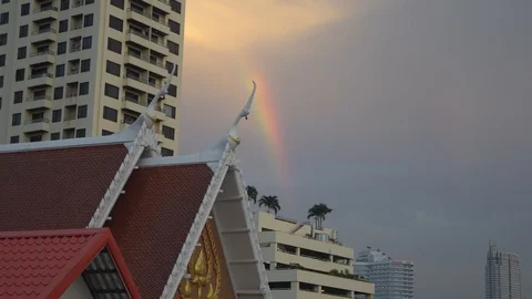 Rainbow above building on evening sky. Stock Footage 110814082