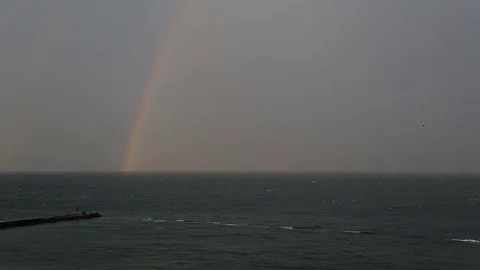 Rainbow above the sea Stock Footage 73342705
