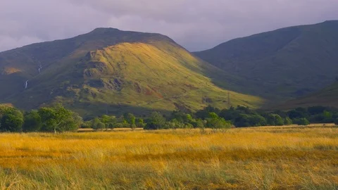 Rainbow after the Rain in a Valley of the Scottish Highlands Video stock 87197646