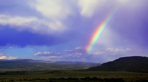 Rainbow after storm in desert - Abiquiu, New Mexico Stock Footage 44212985