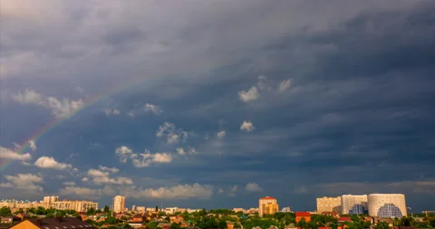 Rainbow against the backdrop of the cityscape Stock Footage 90487234