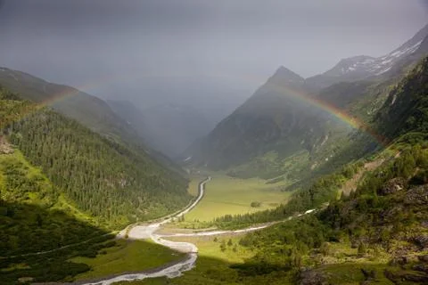 Rainbow in alps Stock Photos