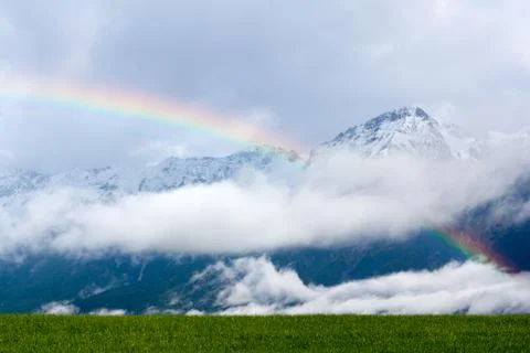 Rainbow in the Alps Stock Photos