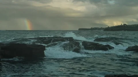 Rainbow and crashing waves Coogee coast  Sydney 4K Stock Footage 276054149