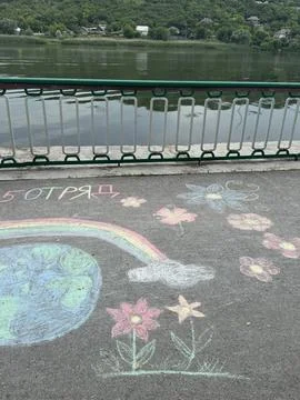 Rainbow and Earth Chalk Drawing Promoting Peace and Friendship. Stock Photos