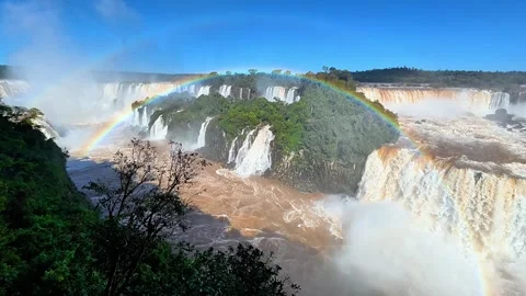 Rainbow and Forested Cascades Across Brazil’s Iguazu Falls Stock Footage 342275549
