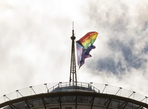 Rainbow and transgender pride flags atop the Space Needle in Seattle Stock Photos