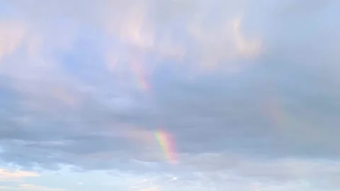 Rainbow Appearing Through High Clouds Stock Footage 152845376