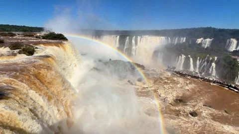 Rainbow Arcing Above Turbulent Cascades at Brazil’s Iguazu Falls Video stock 342275513