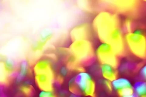 Rainbow background, blurred effect. Glowing holiday light circles are creat.. Stock Photos