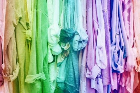 Rainbow background with clothes. Stock Photos