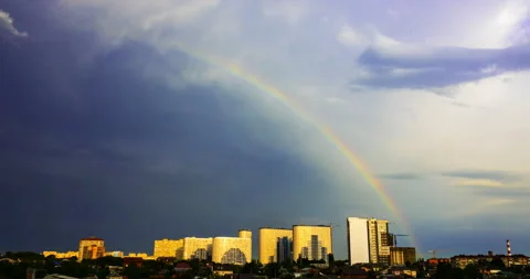 Rainbow on the background of the urban landscape during a thunderstorm Stock Footage 201653483