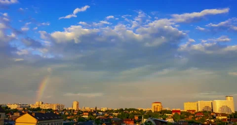 Rainbow on the background of the urban landscape during a thunderstorm Stock Footage 203948339
