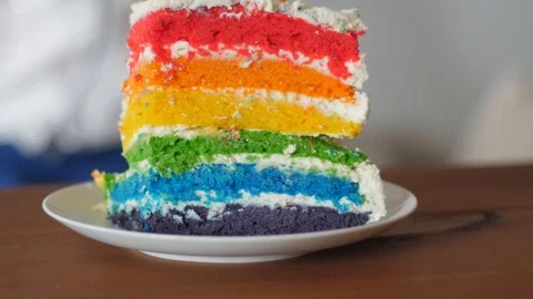 Rainbow birthday cake with candles Stock Footage 85981052