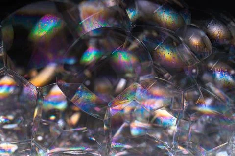 Rainbow in a black background bubble Foto stock