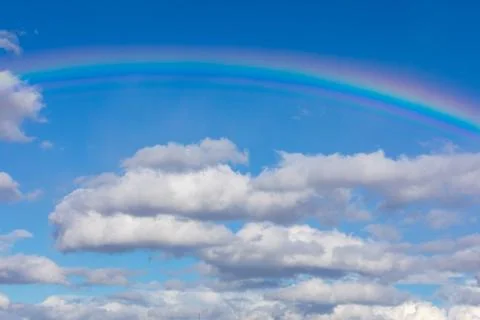 Rainbow in Blue sky with cloud in Germany Foto stock
