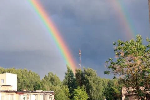Rainbow on blue sky Stock Photos